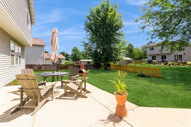 25637 S Fieldstone Ct, Channahon, IL 60410 - fenced backyard with a patio and outdoor dining space