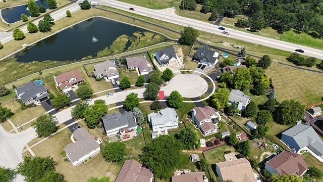 25637 S Fieldstone Ct, Channahon, IL 60410 - aerial view of property's location with nearby suburban area and a nearby body of water