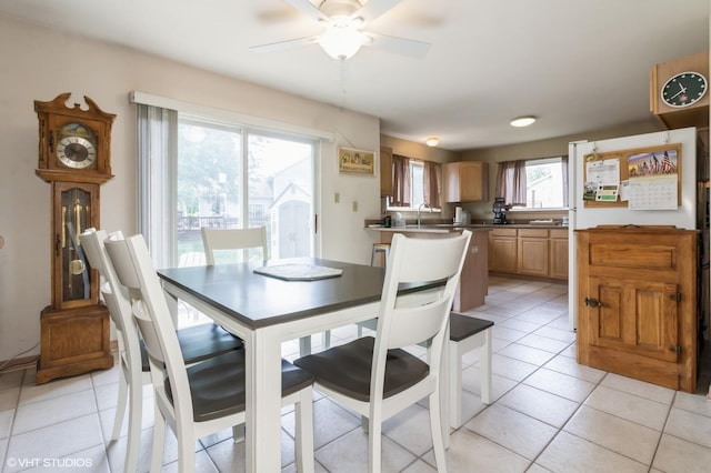 25637 S Fieldstone Ct, Channahon, IL 60410 - dining area with ceiling fan and light tile patterned floors