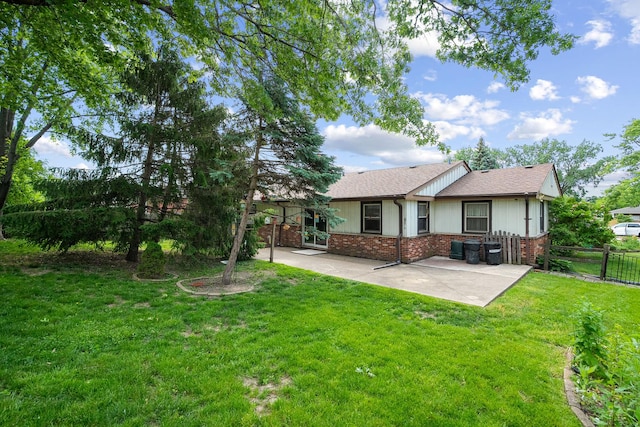 9108 Windsor Dr, Palos Hills, IL 60465 - rear view of property featuring brick siding, a patio area, and roof with shingles