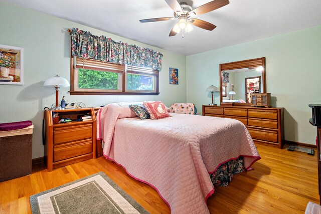 9108 Windsor Dr, Palos Hills, IL 60465 - bedroom with light wood-style floors and a ceiling fan