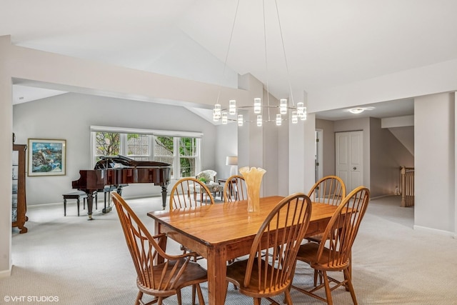 315 Princeton Ln, Glenview, IL 60026 - dining area with light colored carpet, lofted ceiling, and a chandelier