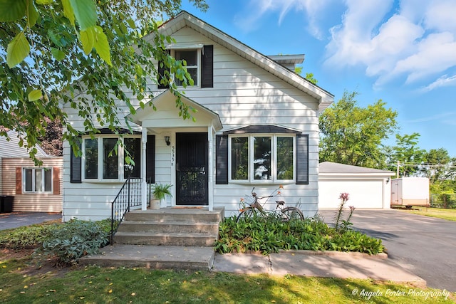 5535 Wonder Woods Dr, Wonder Lake, IL 60097 - view of front of home featuring a garage and an outdoor structure