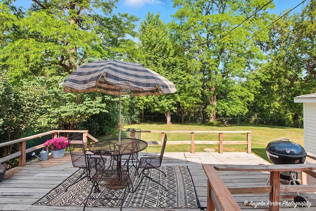 5535 Wonder Woods Dr, Wonder Lake, IL 60097 - wooden terrace featuring outdoor dining space, area for grilling, and view of wooded area