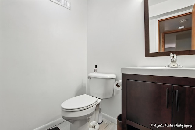 4725 Winnebago Dr, Wonder Lake, IL 60097 - half bath featuring baseboards and vanity