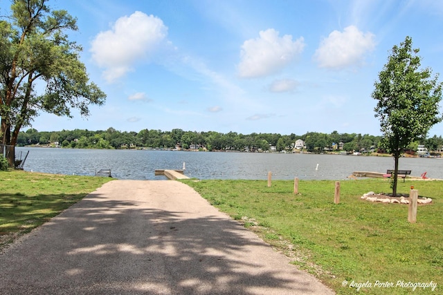 4725 Winnebago Dr, Wonder Lake, IL 60097 - water view featuring a dock and a boat ramp