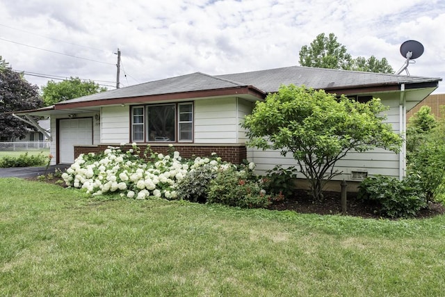 22271 W Terry Dr S, Lake Villa, IL 60046 - view of front facade featuring a garage, driveway, a front yard, and brick siding