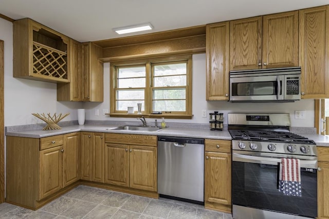 22271 W Terry Dr S, Lake Villa, IL 60046 - kitchen with appliances with stainless steel finishes, brown cabinets, and light countertops