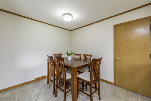 22271 W Terry Dr S, Lake Villa, IL 60046 - dining space with ornamental molding and stone finish floors