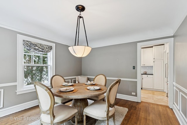 2539 Marcy Ave, Evanston, IL 60201 - dining space with wood finished floors and crown molding