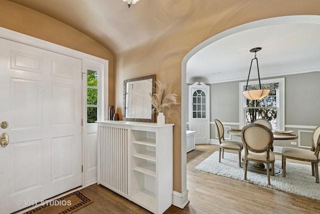 2539 Marcy Ave, Evanston, IL 60201 - entryway featuring arched walkways, wood finished floors, and lofted ceiling