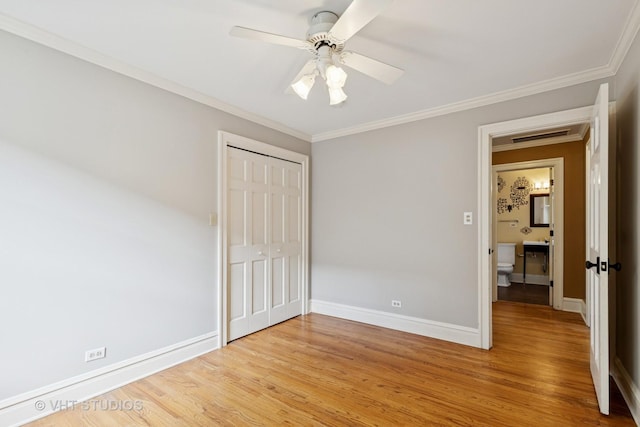 2539 Marcy Ave, Evanston, IL 60201 - unfurnished bedroom featuring light wood-style flooring, ornamental molding, a closet, and a ceiling fan