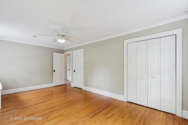 2539 Marcy Ave, Evanston, IL 60201 - unfurnished bedroom with light wood-style flooring, ornamental molding, a closet, and ceiling fan
