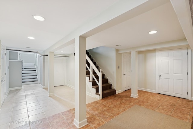 2539 Marcy Ave, Evanston, IL 60201 - finished below grade area with stairway, light tile patterned floors, and recessed lighting