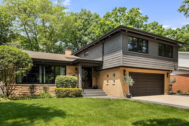 400 S Rose Ave, Park Ridge, IL 60068 - tri-level home featuring a garage, brick siding, a front lawn, concrete driveway, and a chimney