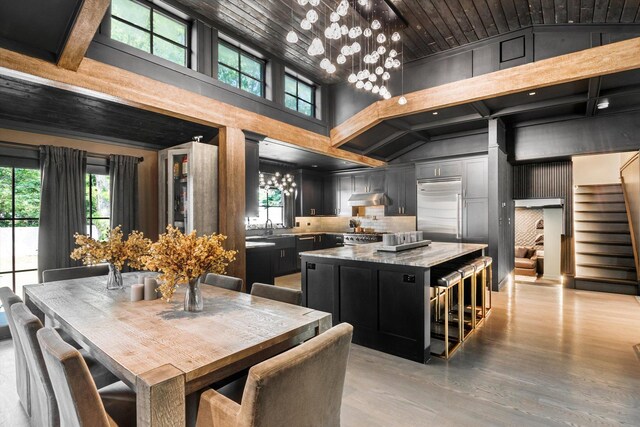 400 S Rose Ave, Park Ridge, IL 60068 - dining room with plenty of natural light, stairway, light wood-style floors, and high vaulted ceiling