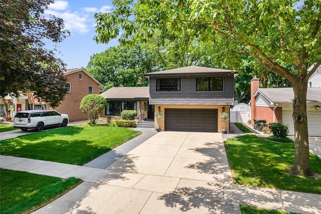 400 S Rose Ave, Park Ridge, IL 60068 - tri-level home featuring an attached garage, a front lawn, and concrete driveway