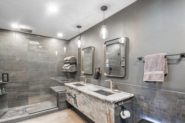 400 S Rose Ave, Park Ridge, IL 60068 - bathroom featuring tiled shower, double vanity, and tile walls