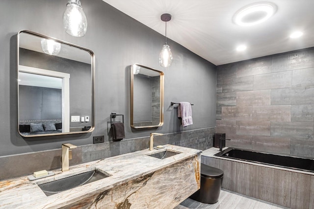 400 S Rose Ave, Park Ridge, IL 60068 - full bath with wood finished floors, double vanity, and tile walls