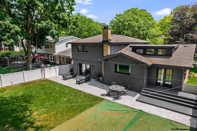 400 S Rose Ave, Park Ridge, IL 60068 - rear view of house with a fenced backyard, roof with shingles, a patio area, a chimney, and french doors