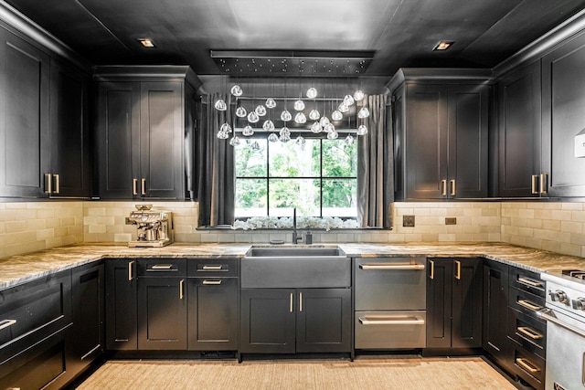 400 S Rose Ave, Park Ridge, IL 60068 - kitchen featuring high end stove, light stone countertops, tasteful backsplash, dark cabinetry, and recessed lighting