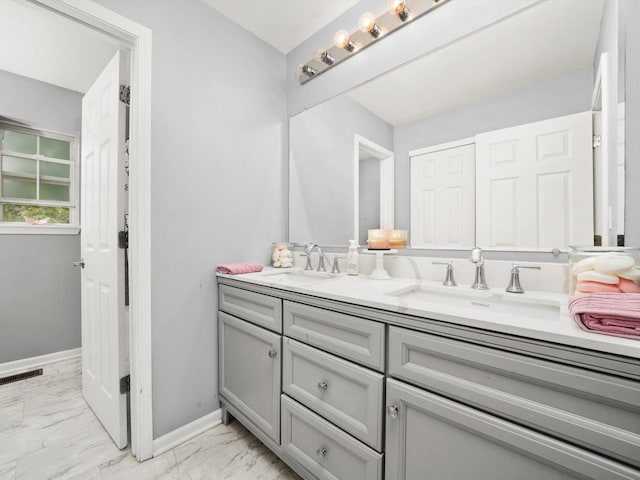 210 Woodford Rd, Oswego, IL 60543 - full bath featuring double vanity and marble look tiles