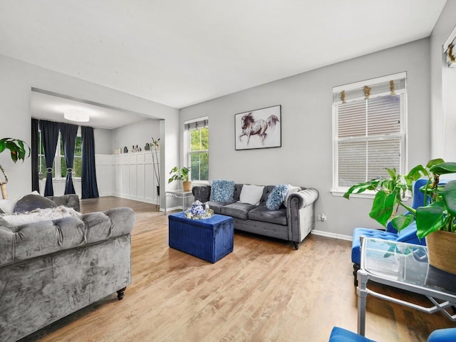 210 Woodford Rd, Oswego, IL 60543 - living room featuring wood finished floors and baseboards