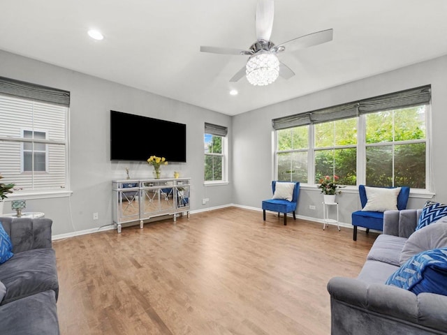210 Woodford Rd, Oswego, IL 60543 - living area featuring wood finished floors, a ceiling fan, and recessed lighting