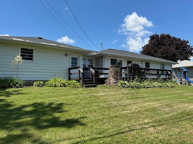 110 Shady Ln, Dixon, IL 61021 - rear view of house with a wooden deck and a yard