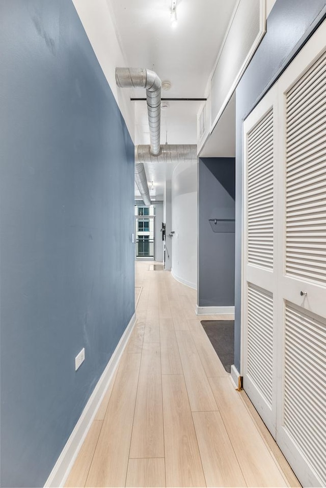 1305 S Michigan Ave Unit 807, Chicago, IL 60605 - corridor featuring baseboards and light wood-style floors