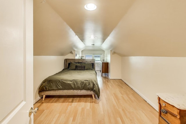 5836 N Oconto Ave, Chicago, IL 60631 - bedroom with light wood-style floors and vaulted ceiling