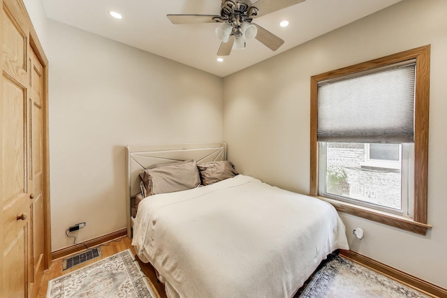 5836 N Oconto Ave, Chicago, IL 60631 - bedroom with wood finished floors, recessed lighting, and a ceiling fan