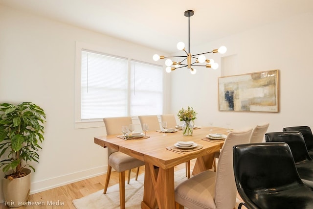 7939 Neva Ave, Burbank, IL 60459 - dining space with a chandelier and light wood-style floors