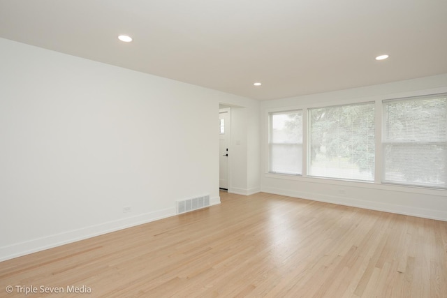 7939 Neva Ave, Burbank, IL 60459 - unfurnished room with light wood-style floors and recessed lighting