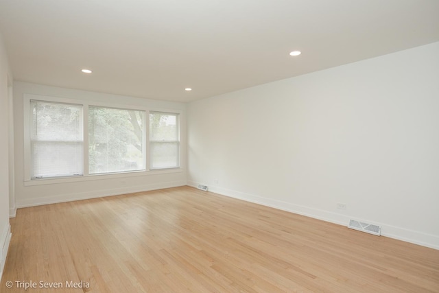 7939 Neva Ave, Burbank, IL 60459 - spare room featuring light wood-style flooring and recessed lighting
