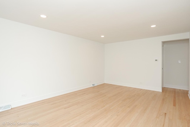 7939 Neva Ave, Burbank, IL 60459 - unfurnished room featuring light wood-type flooring and recessed lighting