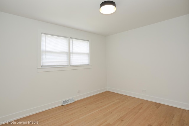 7939 Neva Ave, Burbank, IL 60459 - unfurnished room with light wood finished floors and baseboards