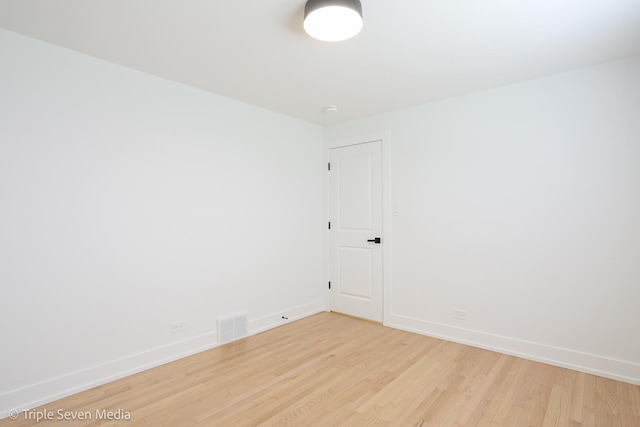 7939 Neva Ave, Burbank, IL 60459 - empty room with light wood-style flooring and baseboards