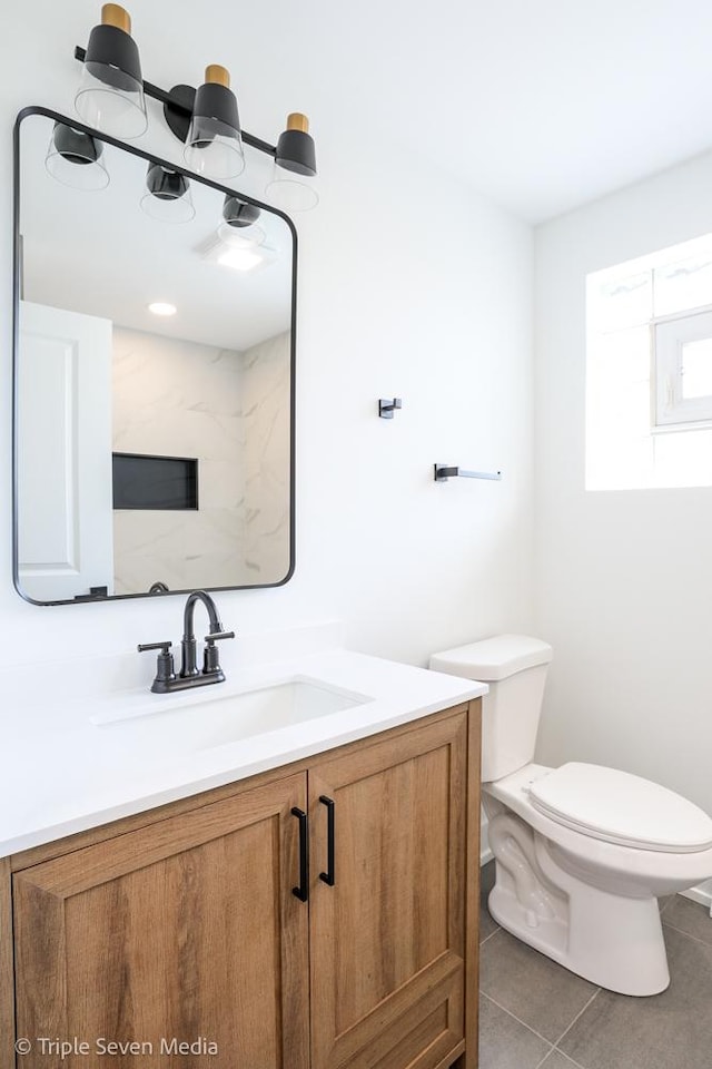 7939 Neva Ave, Burbank, IL 60459 - bathroom with vanity and tile patterned floors