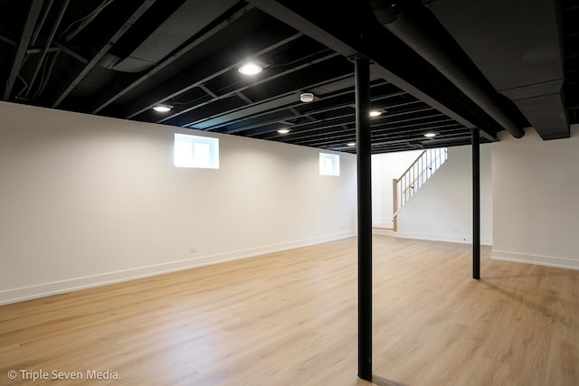 7939 Neva Ave, Burbank, IL 60459 - basement featuring light wood finished floors and stairs