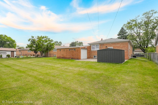 7939 Neva Ave, Burbank, IL 60459 - view of yard featuring an attached garage