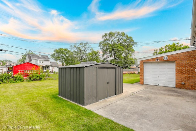 7939 Neva Ave, Burbank, IL 60459 - view of green lawn featuring a storage unit, driveway, and a garage