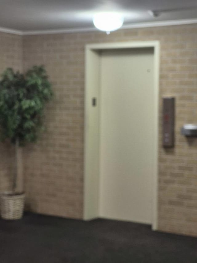 property entrance featuring elevator