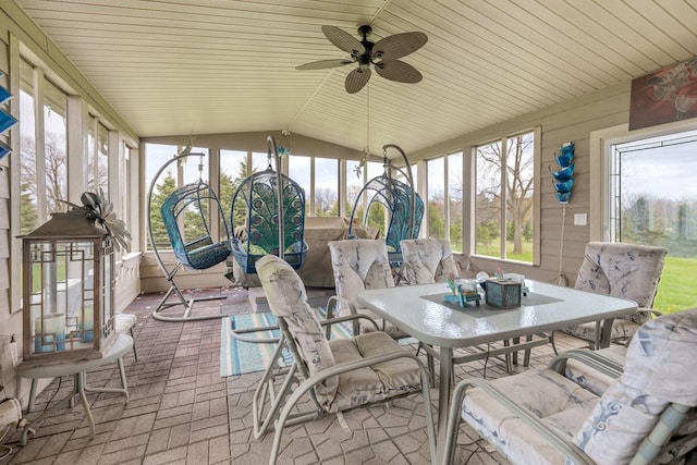 41W072 Bowes Rd, Elgin, IL 60124 - sunroom / solarium featuring brick floors, lofted ceiling, ceiling fan, outdoor dining area, and healthy amount of natural light