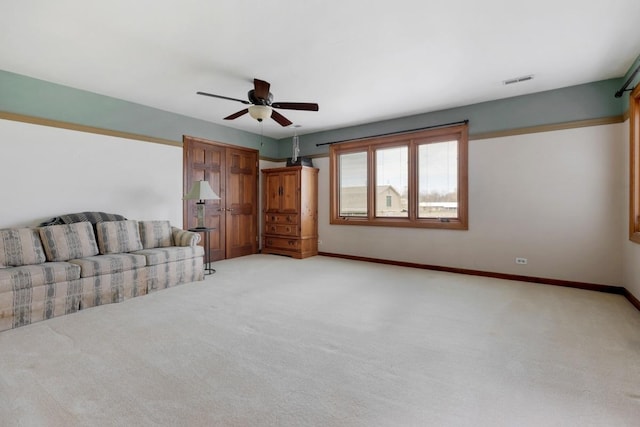 41W072 Bowes Rd, Elgin, IL 60124 - living area with ceiling fan and light colored carpet