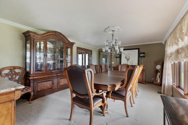 41W072 Bowes Rd, Elgin, IL 60124 - dining area with a chandelier, light colored carpet, crown molding, and french doors