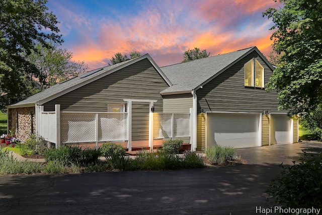 1504 N Denali Trl, Mchenry, IL 60050 - view of front facade featuring asphalt driveway, a garage, and roof with shingles