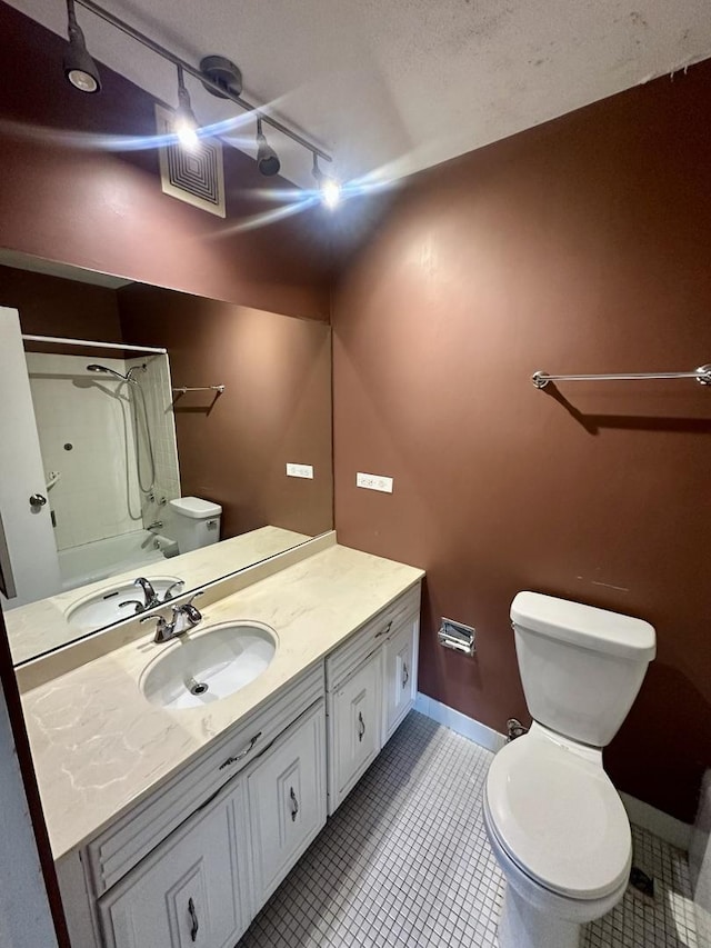 7033 N Kedzie Ave Unit 701, Chicago, IL 60645 - full bath featuring vanity, washtub / shower combination, and tile patterned floors