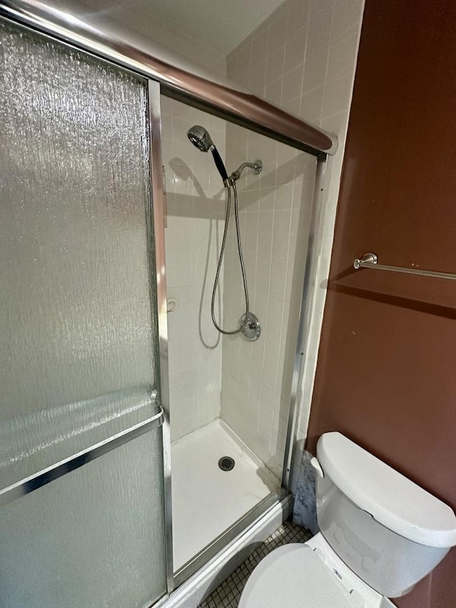7033 N Kedzie Ave Unit 701, Chicago, IL 60645 - bathroom with a shower stall and tile patterned flooring