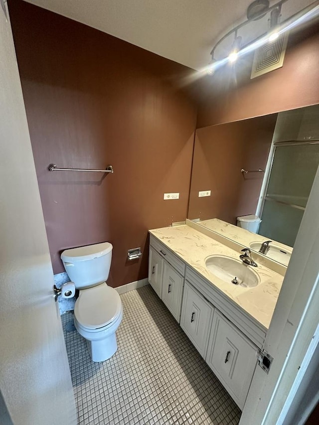 7033 N Kedzie Ave Unit 701, Chicago, IL 60645 - bathroom with vanity and tile patterned floors